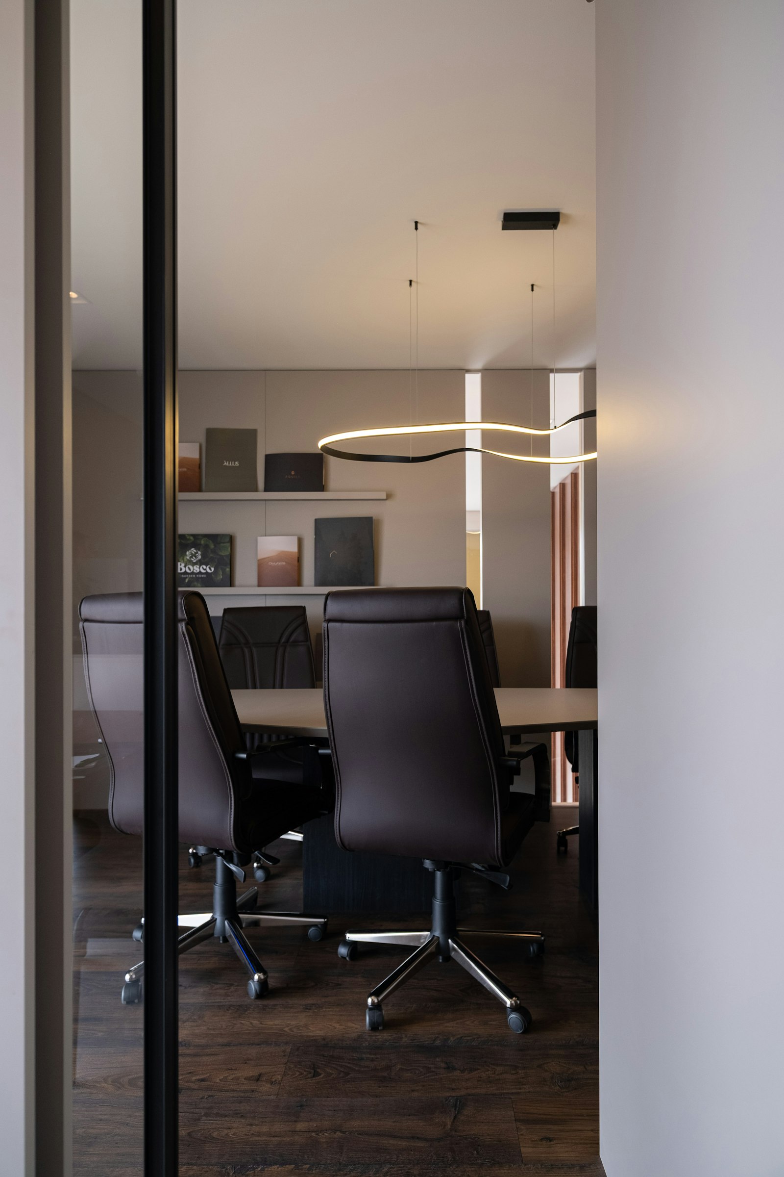 Law firm boardroom with data visualization